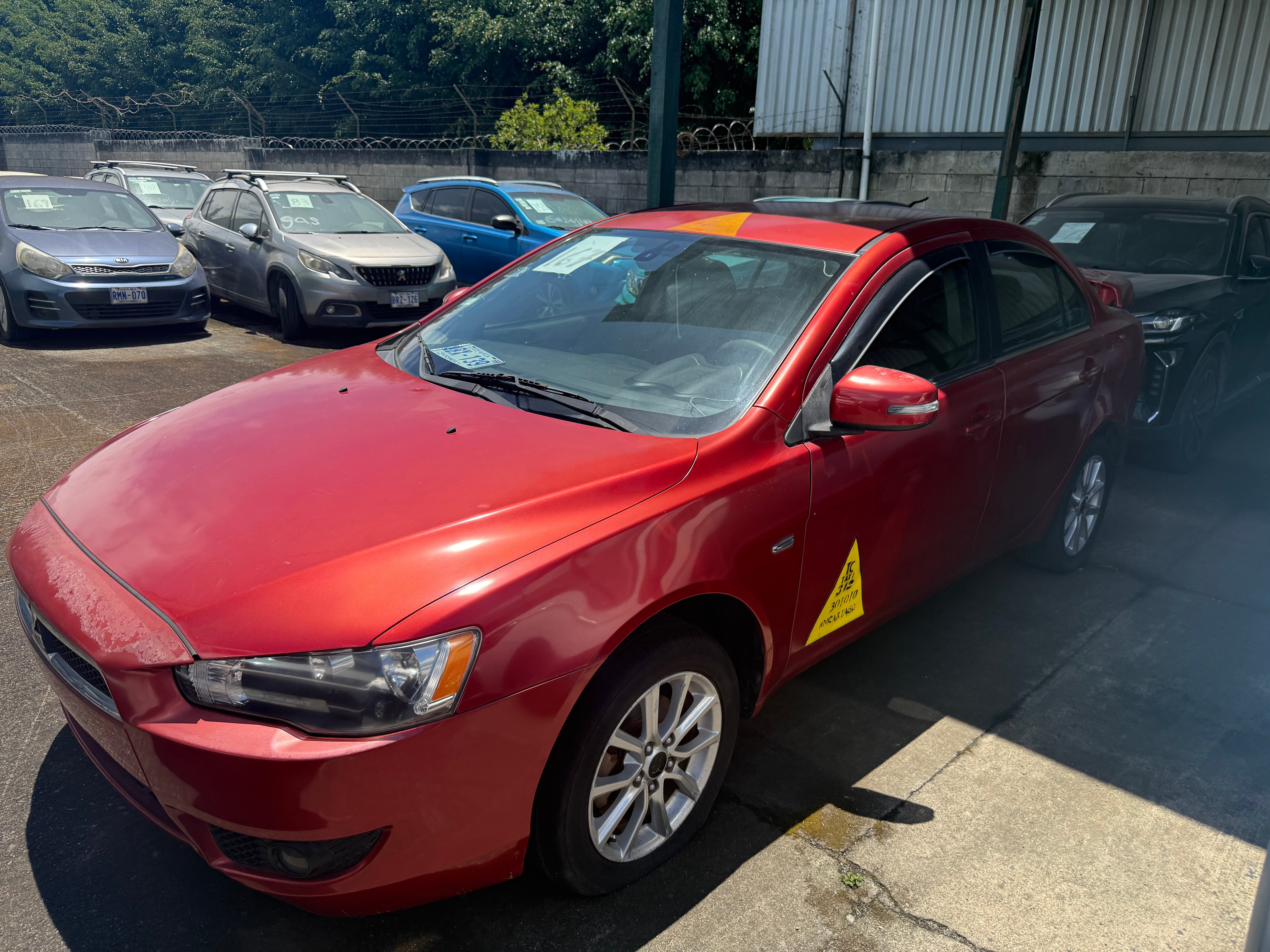 Photo 1 of Vehículo Mitsubishi Lancer, año 2016 (7241-1)